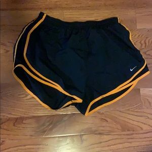 Black Nike running shorts
